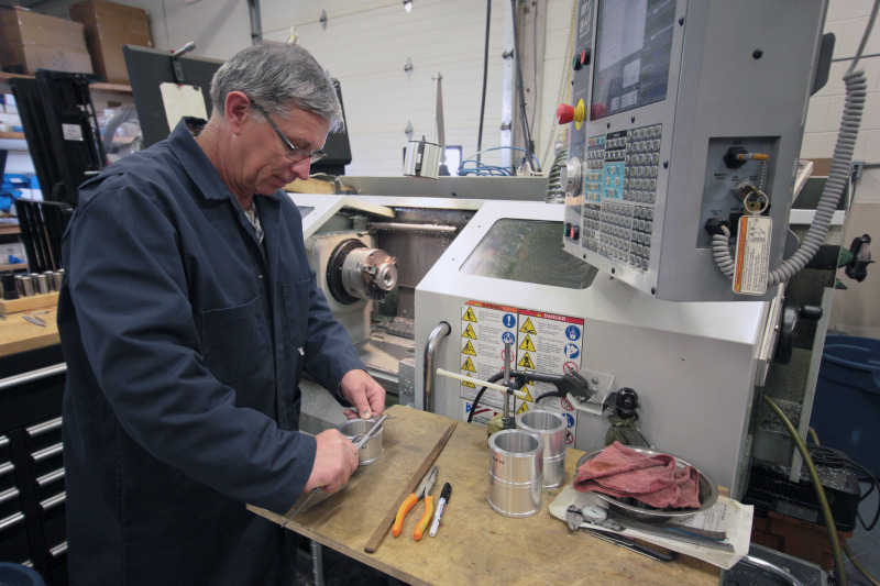 CNC machining of parts and custom parts for UHV LEED & AES spectroscopy instrumentation systems